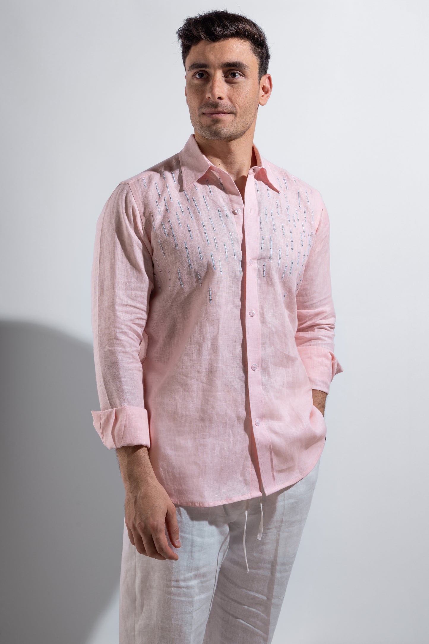 100% linen pink shirt with white embroidery.