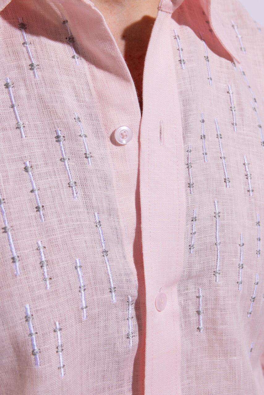 100% linen pink shirt with white embroidery.