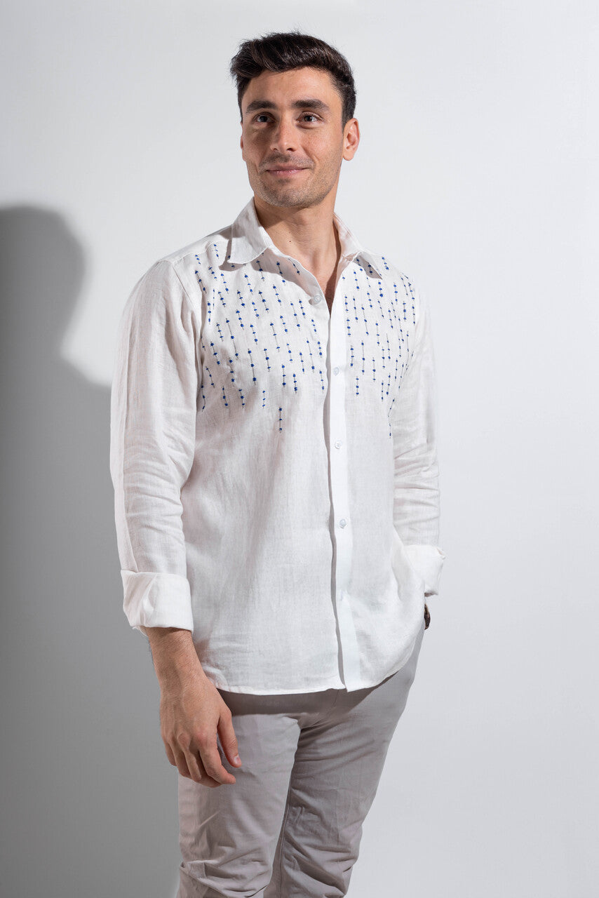 100% linen white shirt with blue embroidery.
